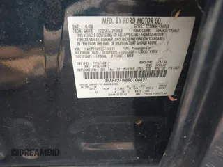 2009 Ford Taurus SEL with VIN 1FAHP24W89G106621, listed as a IAAI auction lot 42209803 with 60,373 mi miles. Bid and sale history available at carsss.com. Image 9.