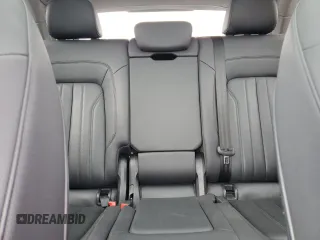 2020 Audi Q5 Premium Plus z VIN WA1BNAFYXL2103409, wystawiony jako Copart lot #56036135 z przebiegiem 83 890 mil mil oraz Szkoda całkowita • Salvage title. Historia ofert i sprzedaży dostępna na DreamBid. Obrazek 10.