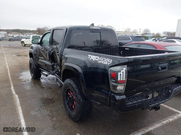 2019 Toyota Tacoma 4WD SR with VIN 3TMCZ5AN1KM247618, listed as a IAAI auction lot 41734570 with 68,796 mi miles. Bid and sale history available at carsss.com. Image 3.