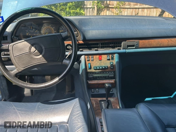 1988 Mercedes-Benz 560 with VIN WDBCA39D0JA421504, listed as a Copart auction lot 52342525 with 82,277 mi miles and Clean Title. Bid and sale history available at DreamBid. Image 9.