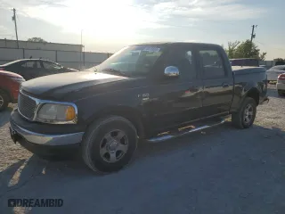 2001 Ford F-150 SuperCrew XLT with VIN 1FTRW07W41KE36887, listed as a Copart auction lot 76418694 with 280,470 mi miles and Salvage Title. Bid and sale history available at carsss.com. Image 1.