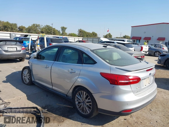 2017 Ford Focus Titanium with VIN 1FADP3J25HL268315, listed as a IAAI auction lot 41606289 with Not provided miles and . Bid and sale history available at DreamBid. Image 3.
