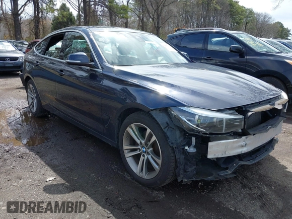 2018 BMW 3 Series 330i xDrive with VIN WBA8Z9C54JG828207, listed as a IAAI auction lot 42000931 with 73,736 mi miles. Bid and sale history available at carsss.com. Image 1.