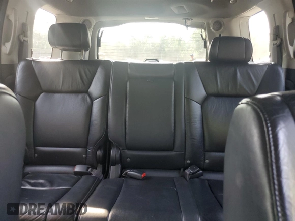 2011 Honda Pilot Touring z VIN 5FNYF4H92BB090512, wystawiony jako Copart lot #57046015 z przebiegiem 159 814 mil mil oraz Szkoda całkowita • Salvage title. Historia ofert i sprzedaży dostępna na DreamBid. Obrazek 10.