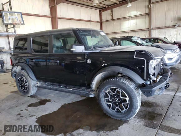 2023 Ford Bronco with VIN 1FMEE5DP2PLA95077, listed as a Copart auction lot 56154525 with 102,335 mi miles and Salvage title. Bid and sale history available at DreamBid. Image 4.