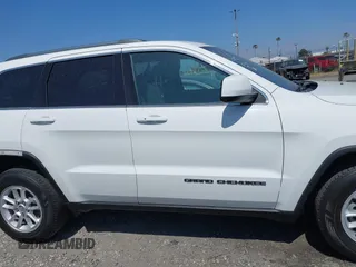 2020 Jeep Grand Cherokee Altitude with VIN 1C4RJEAG3LC202749, listed as a IAAI auction lot 42272959 with 90,698 mi miles and . Bid and sale history available at DreamBid. Image 14.