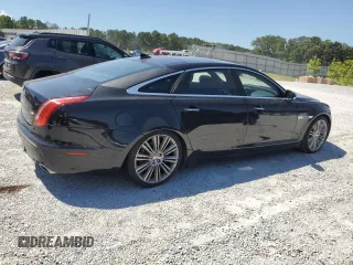 2014 Jaguar XJ Portfolio with VIN SAJWA2GZ2E8V66906, listed as a Copart auction lot 64888135 with 166,194 mi miles and Clean title. Bid and sale history available at DreamBid. Image 3.