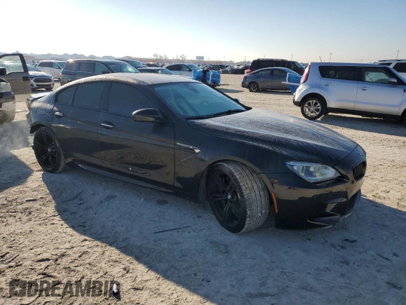 2015 BMW M6 z VIN WBS6C9C5XFD467952, wystawiony jako Copart lot #46312895 z przebiegiem 79 807 mil mil oraz Szkoda całkowita • Salvage title. Historia ofert i sprzedaży dostępna na DreamBid. Obrazek 4.