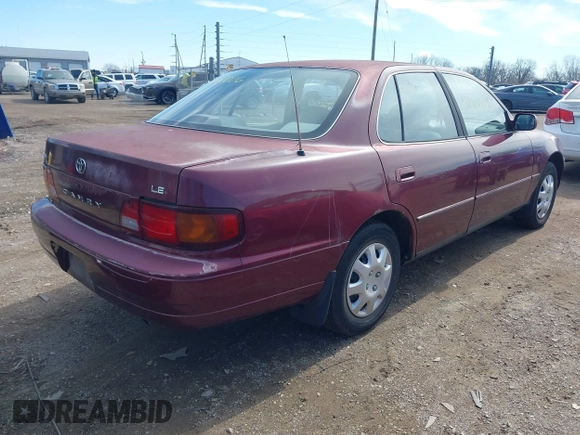 1996 Toyota Camry DX with VIN 4T1BG12K1TU785209, listed as a IAAI auction lot 41802026 with 223,452 mi miles. Bid and sale history available at carsss.com. Image 13.