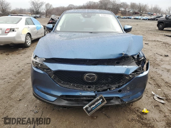 2018 Mazda CX-5 Touring with VIN JM3KFBCM0J0363036, listed as a Copart auction lot 47085755 with 61,928 mi miles and Salvage Title. Bid and sale history available at DreamBid. Image 5.