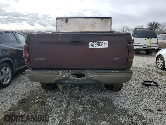 1999 Ford F-150 z VIN 1FTRF18W2XNA60279, wystawiony jako Copart lot #42998315 z przebiegiem Nie podano mil oraz Szkoda całkowita • Salvage title. Historia ofert i sprzedaży dostępna na DreamBid. Obrazek 6.