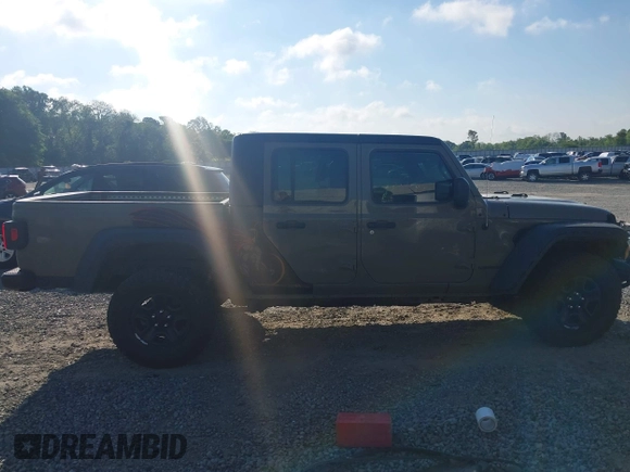 2020 Jeep Gladiator Sport S with VIN 1C6HJTAG0LL216406, listed as a IAAI auction lot 41991629 with 180,125 mi miles and . Bid and sale history available at DreamBid. Image 13.