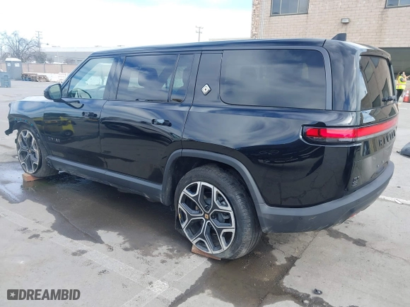 2025 Rivian R1S Adventure with VIN 7PDSGBBA5SN055497, listed as a IAAI auction lot 41695600 with 5,387 mi miles. Bid and sale history available at carsss.com. Image 3.