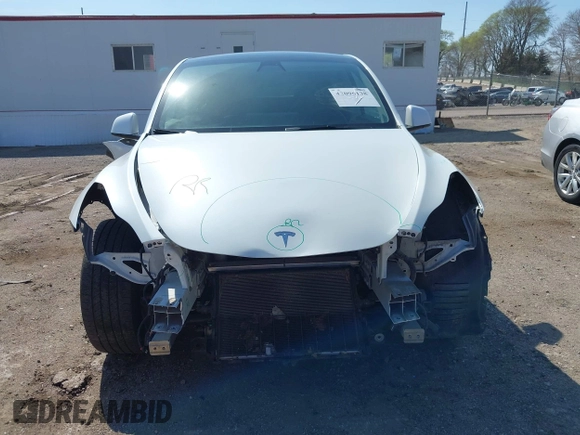 2021 Tesla Model Y Long Range with VIN 5YJYGDEE4MF122362, listed as a IAAI auction lot 42096138 with 47,006 mi miles and . Bid and sale history available at DreamBid. Image 13.