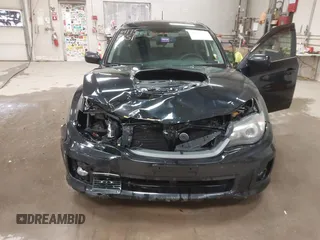 2011 Subaru Impreza Sedan WRX WRX Premium with VIN JF1GV7F6XBG517651, listed as a IAAI auction lot 41158551 with 141,334 mi miles. Bid and sale history available at carsss.com. Image 17.