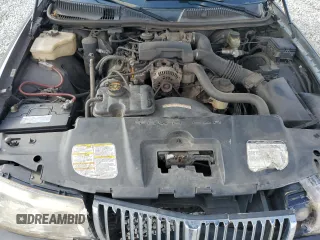 1999 Lincoln Town Car Executive z VIN 1LNHM81W4XY714116, wystawiony jako Copart lot #44424595 z przebiegiem 210 041 mil mil oraz Szkoda całkowita • Salvage title. Historia ofert i sprzedaży dostępna na DreamBid. Obrazek 11.