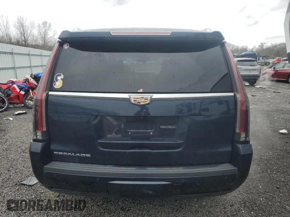 2017 Cadillac Escalade Luxury with VIN 1GYS4BKJ2HR236875, listed as a Copart auction lot 52328095 with 103,335 mi miles and Salvage title. Bid and sale history available at DreamBid. Image 6.