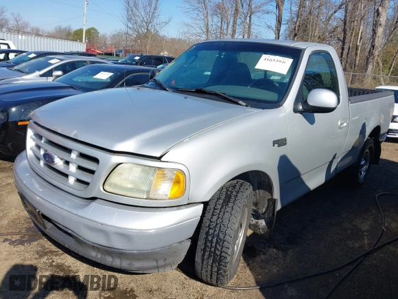 2002 Ford F-150 XL with VIN 1FTRF17222NC00760, listed as a IAAI auction lot 41653940 with 314,637 mi miles. Bid and sale history available at carsss.com. Image 17.