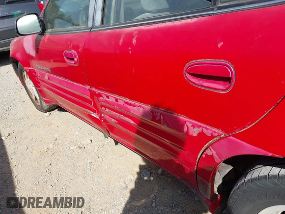 1999 Pontiac Grand Am SE with VIN 1G2NE52T5XC528335, listed as a IAAI auction lot 41910919 with 18,131 mi miles and . Bid and sale history available at DreamBid. Image 15.