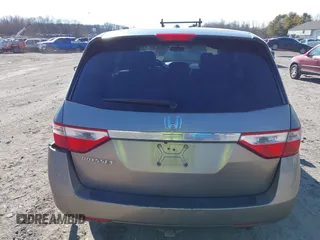 2012 Honda Odyssey EX-L with VIN 5FNRL5H63CB016526, listed as a IAAI auction lot 41701396 with 132,016 mi miles and . Bid and sale history available at carsss.com. Image 17.