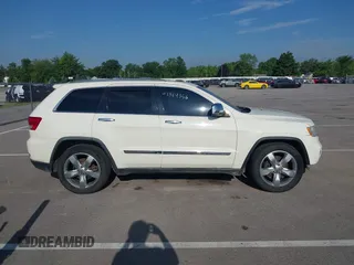 2011 Jeep Grand Cherokee Overland with VIN 1J4RR6GT2BC631909, listed as a IAAI auction lot 42564356 with 205,954 mi miles and . Bid and sale history available at DreamBid. Image 13.