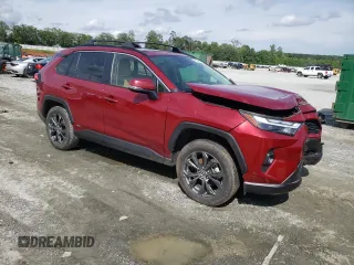 2023 Toyota RAV4 Hybrid XLE Premium with VIN JTMB6RFV2PD541262, listed as a Copart auction lot 60106845 with 32,447 mi miles and Salvage title. Bid and sale history available at DreamBid. Image 4.