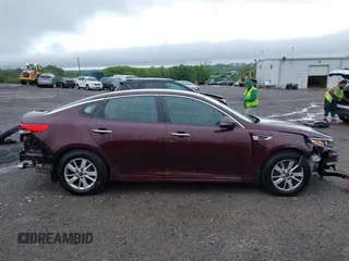 2016 Kia Optima LX with VIN 5XXGT4L31GG053429, listed as a IAAI auction lot 42464513 with 122,397 mi miles and . Bid and sale history available at DreamBid. Image 14.