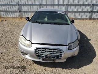 2001 Chrysler LHS z VIN 2C3HC56G11H643759, wystawiony jako Copart lot #70924974 z przebiegiem 124 263 mil mil oraz Tytuł czysty. Historia ofert i sprzedaży dostępna na DreamBid. Obrazek 5.