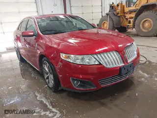 2009 Lincoln MKS with VIN 1LNHM94R59G610559, listed as a IAAI auction lot 41704552 with 168,556 mi miles. Bid and sale history available at carsss.com. Image 1.