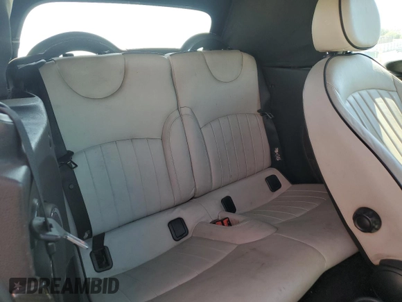 2011 MINI Convertible S с VIN WMWZP3C59BT249133, выставлен на аукционе Copart как лот 56402615 с пробегом 103 809 миль миль и Списание • Salvage title. История ставок и продаж доступна на DreamBid. Изображение 10.