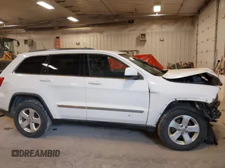 2011 Jeep Grand Cherokee 70th Anniversary with VIN 1J4RR4GG4BC702759, listed as a IAAI auction lot 41871604 with 143,583 mi miles. Bid and sale history available at carsss.com. Image 13.