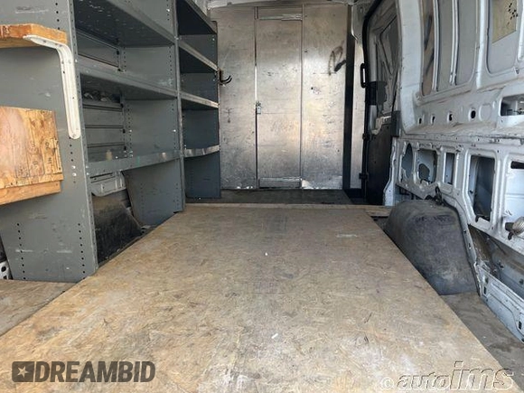 2020 Ford Transit Cargo with VIN 1FTBW3X85LKB80928, listed as a IAAI auction lot 42762756 with 70,670 mi miles and . Bid and sale history available at DreamBid. Image 11.