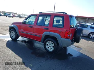 2004 Jeep Liberty Sport with VIN 1J4GL48K04W326252, listed as a IAAI auction lot 41479037 with 168,994 mi miles. Bid and sale history available at carsss.com. Image 3.