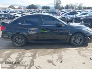 2014 Subaru Impreza Sedan WRX WRX Premium with VIN JF1GV7F6XEG011659, listed as a IAAI auction lot 41408915 with 133,836 mi miles. Bid and sale history available at carsss.com. Image 13.