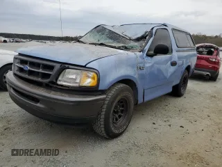 1997 Ford F-150 z VIN 1FTDF1721VNC60947, wystawiony jako Copart lot #77419524 z przebiegiem 28 696 mil mil oraz Szkoda całkowita • Salvage title. Historia ofert i sprzedaży dostępna na DreamBid. Obrazek 1.