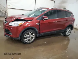 2016 Ford Escape Titanium with VIN 1FMCU9J95GUC57205, listed as a Copart auction lot 71033934 with 90,477 mi miles and Salvage Title. Bid and sale history available at DreamBid. Image 1.