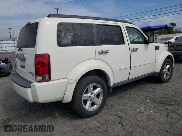 2010 Dodge Nitro SXT z VIN 1D4PT5GK8AW100343, wystawiony jako Copart lot #74628804 z przebiegiem 156 612 mil mil oraz Szkoda całkowita • Salvage title. Historia ofert i sprzedaży dostępna na DreamBid. Obrazek 3.