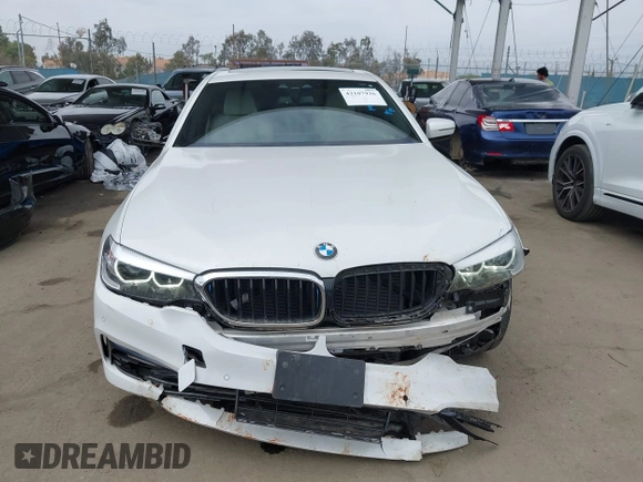 2018 BMW 5 Series 530e with VIN WBAJA9C5XJB033667, listed as a IAAI auction lot 42107936 with 55,753 mi miles and . Bid and sale history available at DreamBid. Image 13.