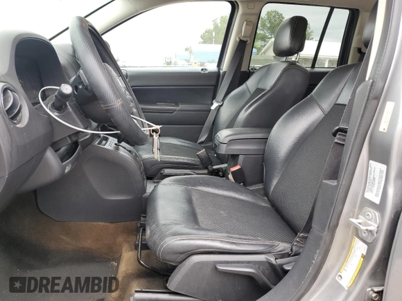 2016 Jeep Compass Sport SE z VIN 1C4NJCBA1GD634477, wystawiony jako Copart lot #50922425 z przebiegiem 141 375 mil mil oraz Szkoda całkowita • Salvage title. Historia ofert i sprzedaży dostępna na DreamBid. Obrazek 7.