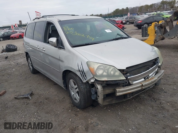 2005 Honda Odyssey EX with VIN 5FNRL38435B071998, listed as a IAAI auction lot 41808601 with 999,999 mi miles. Bid and sale history available at carsss.com. Image 1.