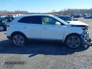 2015 Lincoln MKC with VIN 5LMTJ2AH8FUJ31911, listed as a IAAI auction lot 41735017 with 76,332 mi miles. Bid and sale history available at carsss.com. Image 13.