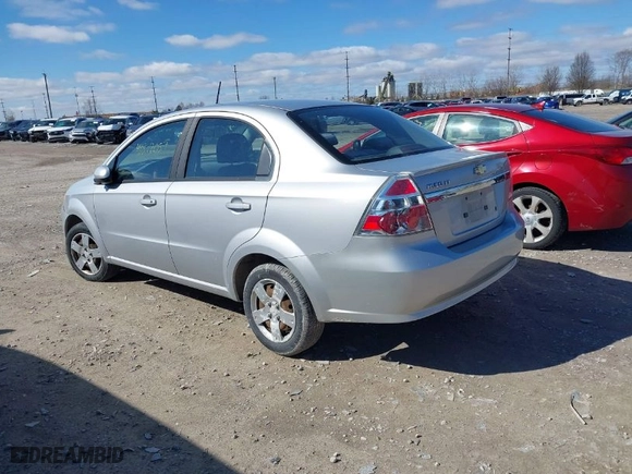 2010 Chevrolet Aveo LT w/1LT with VIN KL1TD5DE0AB134556, listed as a IAAI auction lot 41822057 with 107,523 mi miles. Bid and sale history available at carsss.com. Image 3.