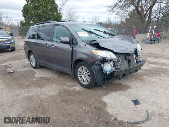 2014 Toyota Sienna XLE with VIN 5TDYK3DC0ES422700, listed as a IAAI auction lot 42049181 with 147,498 mi miles. Bid and sale history available at carsss.com. Image 1.