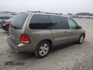 2005 Ford Freestar z VIN 2FMZA57215BA15987, wystawiony jako Copart lot #66308294 z przebiegiem 95 515 mil mil oraz Szkoda całkowita • Salvage title. Historia ofert i sprzedaży dostępna na DreamBid. Obrazek 3.