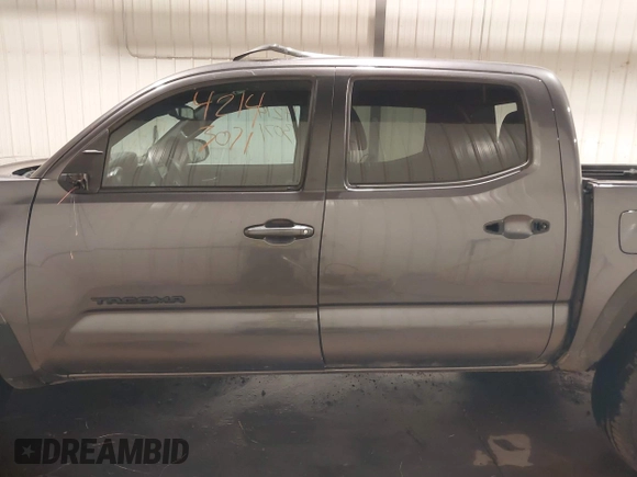 2019 Toyota Tacoma SR with VIN 5TFCZ5AN7KX208672, listed as a IAAI auction lot 42143071 with 83,584 mi miles and . Bid and sale history available at DreamBid. Image 15.