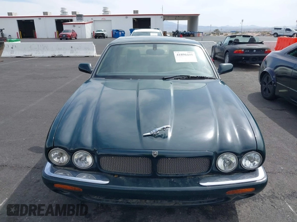 2003 Jaguar XJ with VIN SAJDA15B73MF53499, listed as a IAAI auction lot 41896445 with 95,055 mi miles and . Bid and sale history available at DreamBid. Image 12.