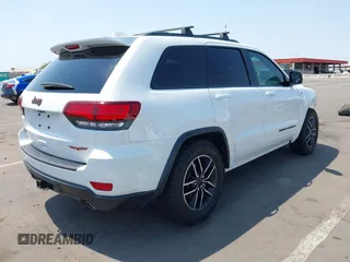 2019 Jeep Grand Cherokee Trailhawk with VIN 1C4RJFLT7KC751143, listed as a IAAI auction lot 42749406 with 54,024 mi miles and . Bid and sale history available at DreamBid. Image 4.