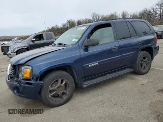 2004 GMC Envoy SLT with VIN 1GKDT13S242201036, listed as a Copart auction lot 50698255 with 152,575 mi miles and Salvage Title. Bid and sale history available at carsss.com. Image 1.