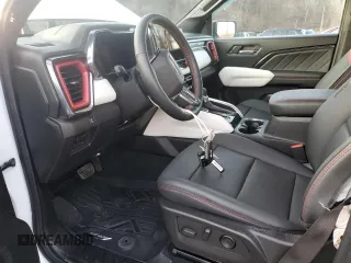 2024 GMC Canyon 4WD AT4X with VIN 1GTP6EEKXR1134879, listed as a Copart auction lot 44358345 with 12,567 mi miles and Salvage Title. Bid and sale history available at carsss.com. Image 7.