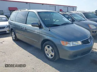 2001 Honda Odyssey EX z VIN 2HKRL18601H532141, wystawiony jako IAAI lot #41981052 z przebiegiem 126 931 mil mil oraz . Historia ofert i sprzedaży dostępna na DreamBid. Obrazek 1.